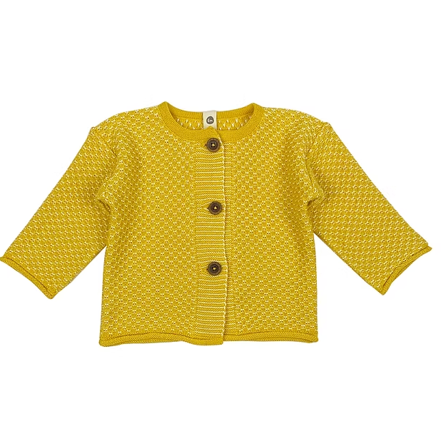 A yellow knitted cardigan with a basket stitch pattern and dark coconut buttons.