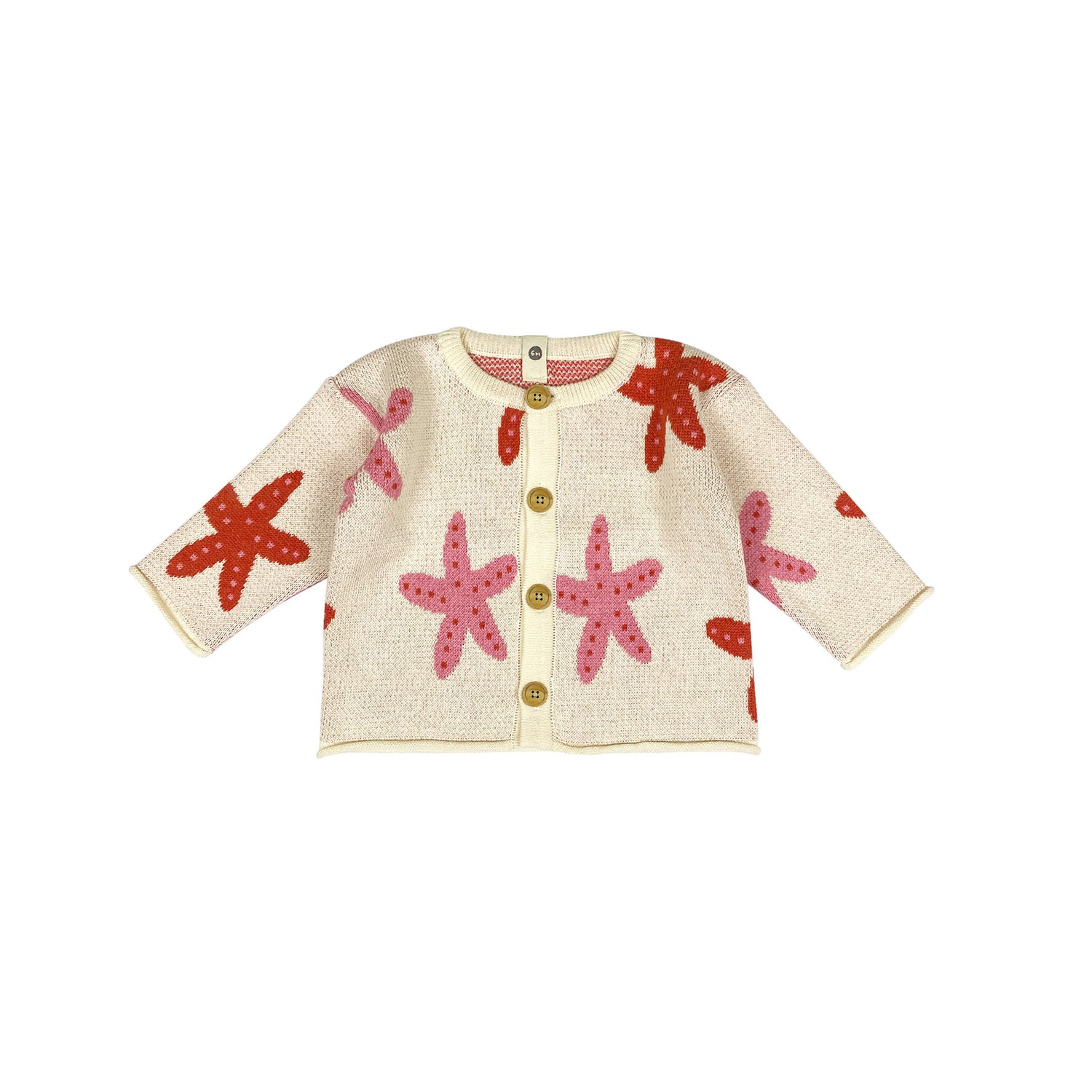 Children's cardigan with starfish pattern on a white background